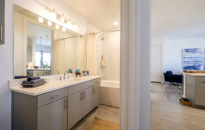 spacious bathroom at Reveal on the Lake apartments