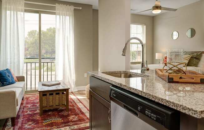 a kitchen with a sink and a counter top