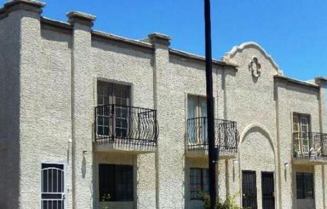 2 story townhome with cute balconies.