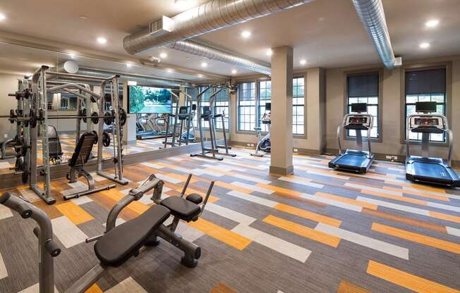 Fitness Center with Cardio, CrossFit & Yoga Components at Echo at North Pointe Center Apartment Homes, Alpharetta, GA 30009