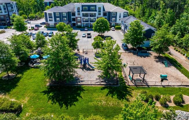 a birds eye view of legacy apartments and a park