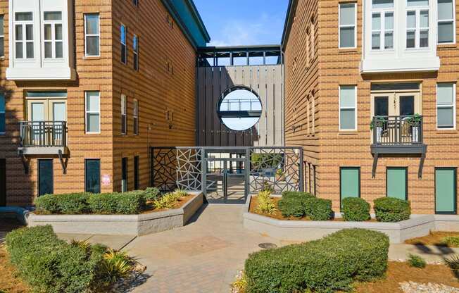 Flatiron West Trade Apartments elevated covered walkway