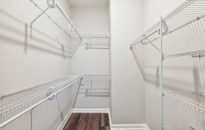 a spacious walk in closet with stainless steel shelves at Metro 303, Hempstead New York