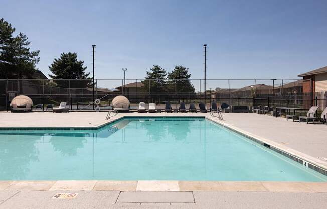 the swimming pool at the resort on a sunny day