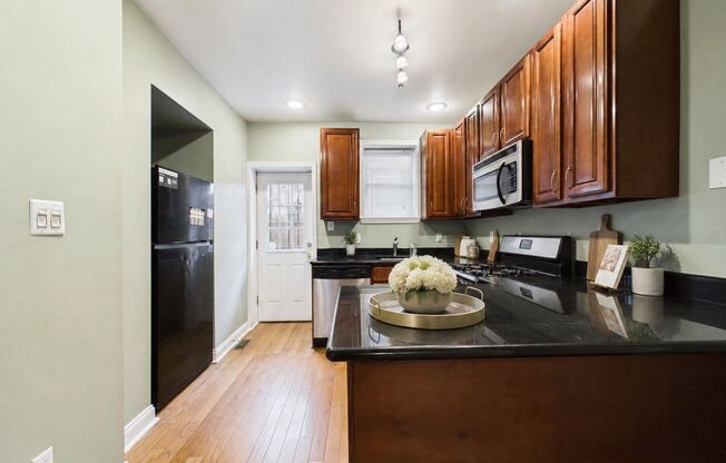 Lower Moyamensing Townhome with Private Patio, Finished Basement & Modern Updates