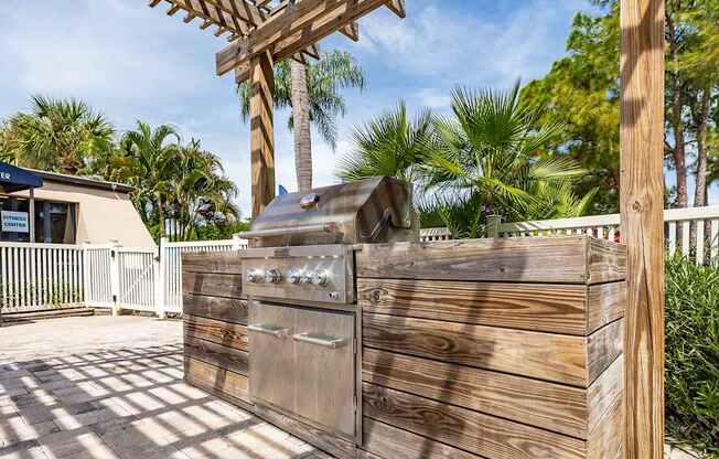 A wooden fence with a mailbox on it.