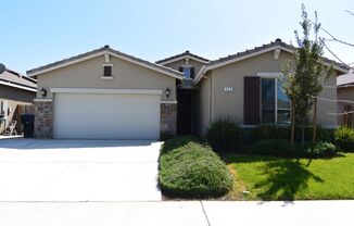 Very new home in great North West Visalia neighborhood with solar