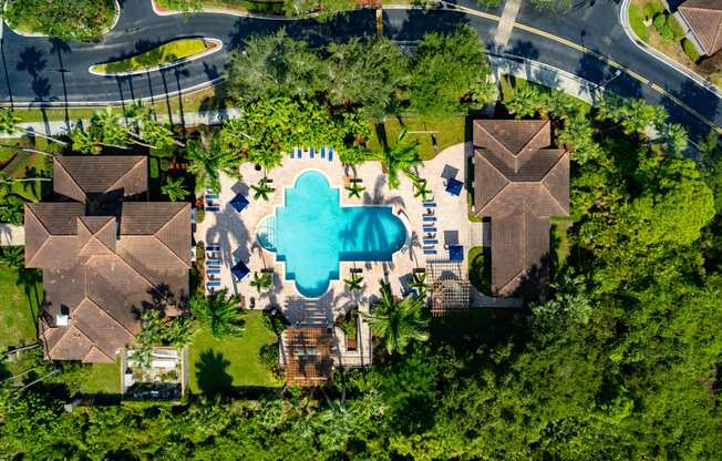 aerial view of a house with a swimming pool at Heritage Bay, Jensen Beach Florida