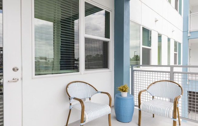 balcony with model patio set at Residences at The Green in Lakewood Ranch