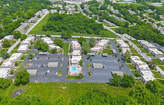 aerial view of a apartment community and trees