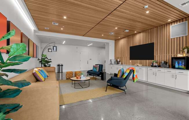 a living room with a couch and chairs  ironside apartments