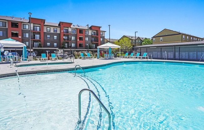 our apartments have a resort style pool with chaise lounge chairs