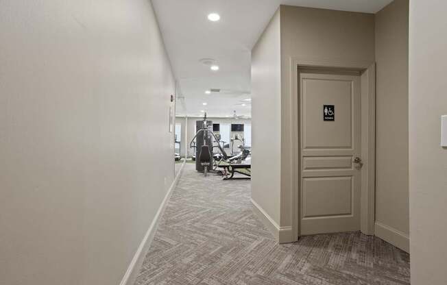 Flatiron West Trade Apartments 24 hour fitness center with free weights, cardio machines, and weightlifting machines