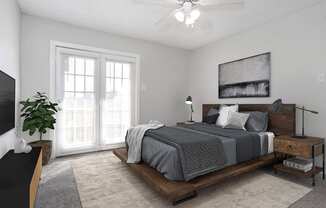 a bedroom with a bed and a ceiling fan