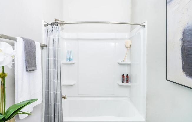 Relax in designer bathrooms featuring spacious garden-style tubs.
