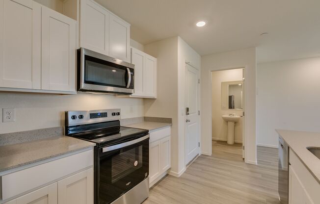 Gorgeous Townhome with upgrades in gated community* 3 large bedrooms, 2 car garage*Community pool, park, tennis courts pluse more*