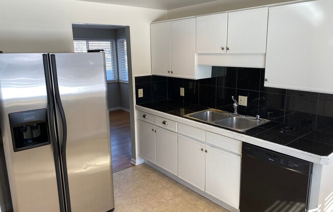$0 DEPOSIT OPTION. CHARMING BRICK RANCH WITH FINISHED BASEMENT ON LARGE CORNER LOT NEAR DOWNTOWN LITTLETON
