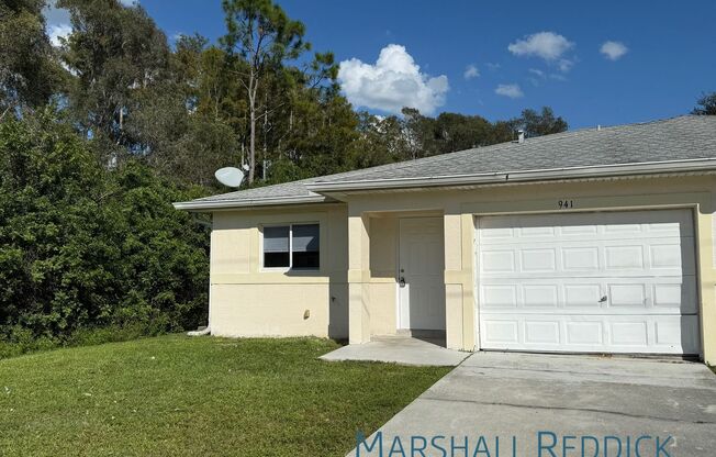 Beautiful wood tile floors! 3 Bed 2 Bath 1 car garage Duplex for rent!