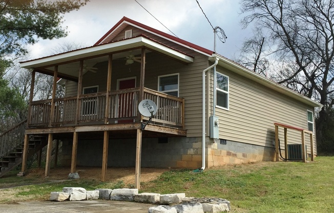 Charming 2-Bedroom Home with Porch & Storage Space