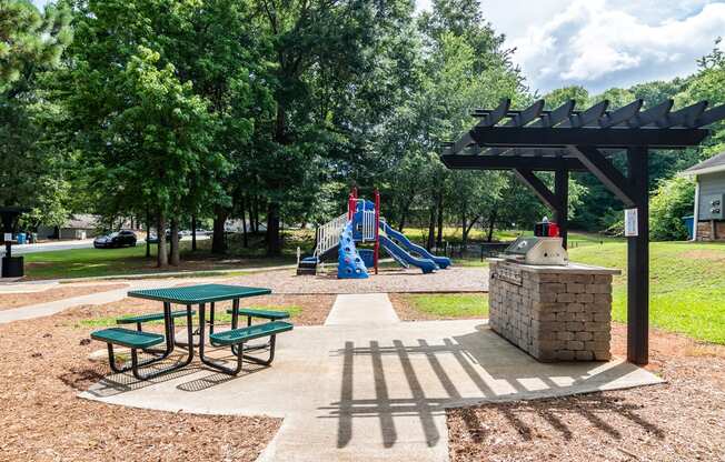 Picnic Area With Grilling Facility  at Serene at Creekstone Apartments, Athens, GA