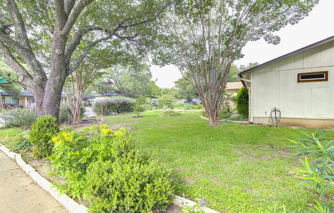 Freshly Updated 4 Bed Home with Solar Panels & Incredible Native Landscaping