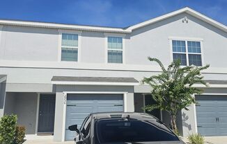 THE STUNNING TWO STORY TOWNHOME