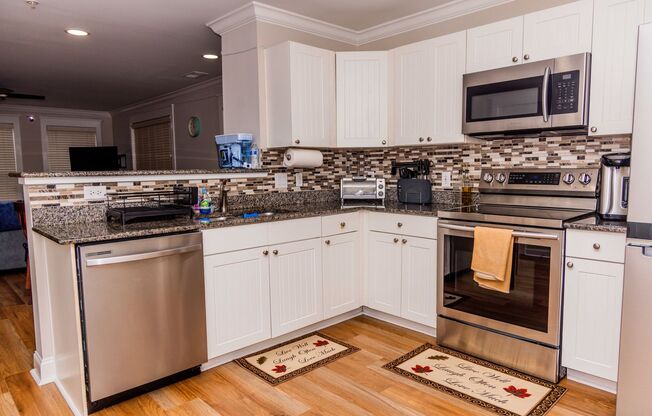 2 Bedroom/ 2 bath - entry level END UNIT with side balcony- Fully Furnished and only a $500 deposit- 1 month free!