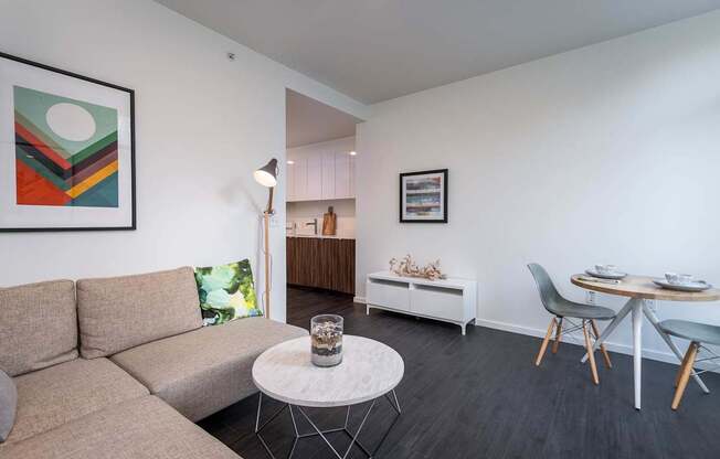 a living room with a couch and a table