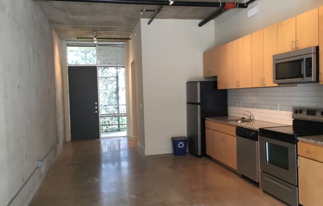 Fully Equipped Kitchen With Modern Appliances at 1221 Broadway Lofts, San Antonio, 78215