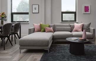 Modern living room inside a luxury apartment for rent at The Pepper Building, one of Philadelphia’s top apartment buildings near 1830 Lombard Street.