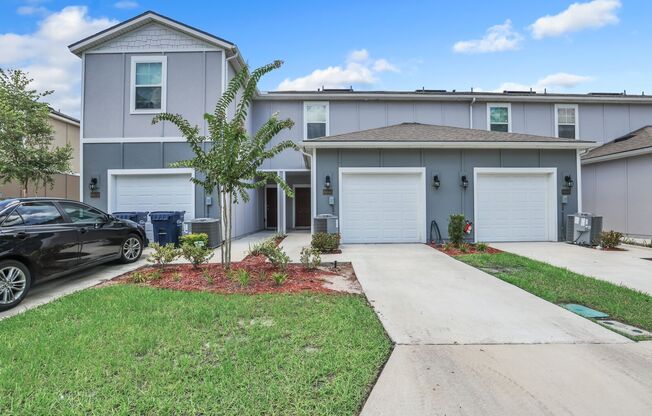 Like new 2 bedroom/ 2.5 bathroom with one car garage townhome in Nassau county!