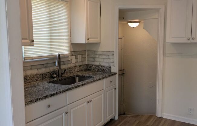 9809 Philip 3bed/1bath with formal dining room and new kitchen located in Outer Dr.- Hayes