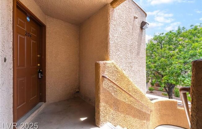 INVITING 2 BEDROOM TOP FLOOR CONDO IN A CENTRAL LOCATION NEAR UNLV AND THE STRIP