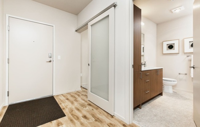 a bathroom with a shower and a sink and a toilet at The Hayes on Stone Way, Washington, 98103