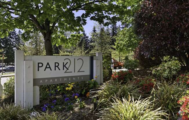 a park with a sign that says park 22 apartments