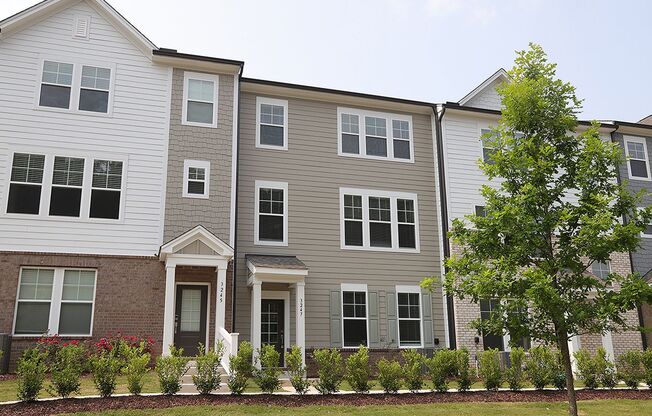 Highly Upgraded Townhome in Superb North Raleigh Location