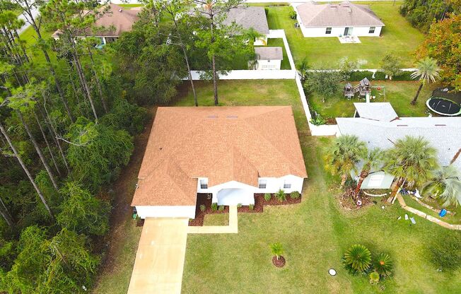 Spacious 4 Bed 2 Bath Home in Palm Coast w Fenced Yard!