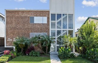 Property Exterior Front with Landscaping and Signage at Wilson Apartments in Glendale, CA