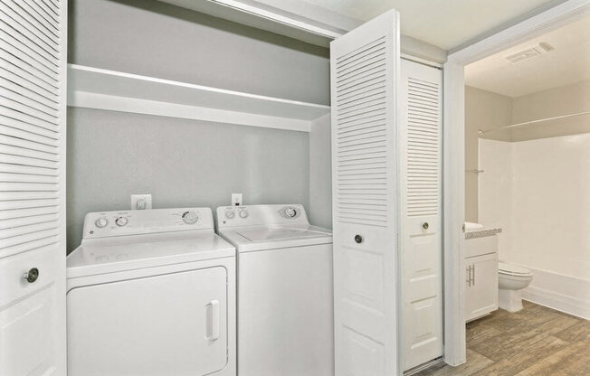Model unit with washer and dryer in closet