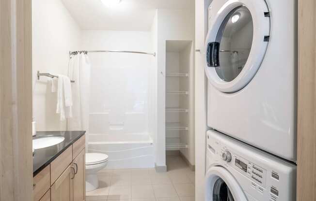 7West Apartment Homes Bathroom with In-Unit Washer and Dryer