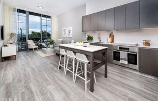 240 NW 25th St