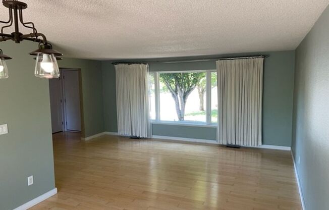Beautifully Updated Home with Large Yard and in quite Great Neighborhood.