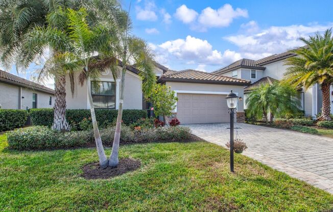 4 Bedroom 3 Bathroom Pool Home with a Pond View in a Gated Community