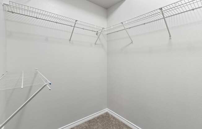 our spacious closets are equipped with shelves and hooks for hanging clothes