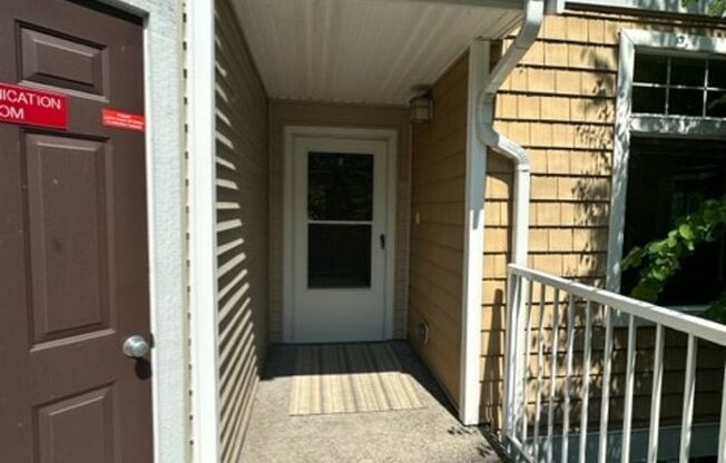 Charming corner 2 bedroom 2 bath with attached Garage!