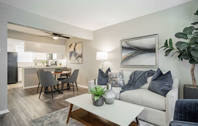 a living room with a couch and a table