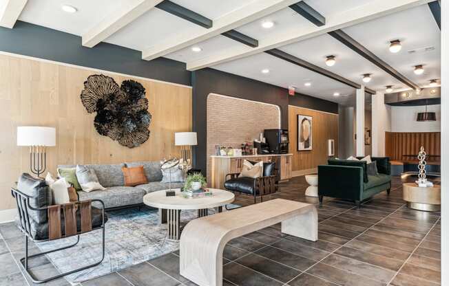 a lobby with couches and chairs and a coffee table