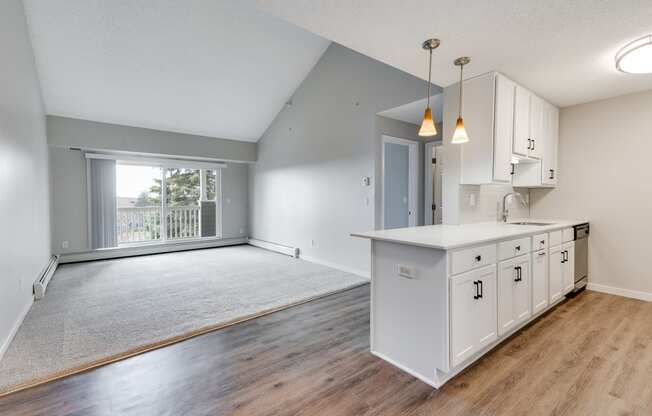 Open Concept Kitchen with Vaulted Ceilings in the Living Room