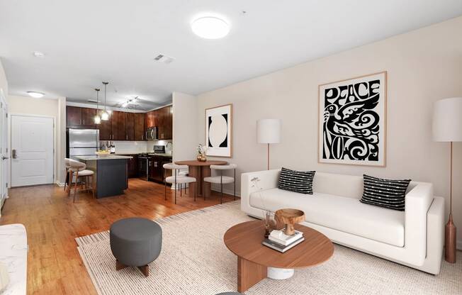 A living room with a white couch and a coffee table  at Metro 303, Hempstead, NY, 11550