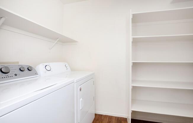 a white refrigerator freezer sitting in a room